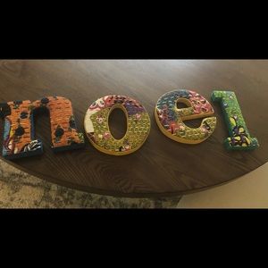Decorative wall art spelling NOEL